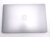 dell laptop computer with dell logo on the back of it