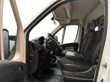 a white van with black seats and a steering wheel