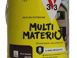 un pot de peinture jaune et noir sur fond blanc
