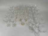a lot of empty wine glasses sitting on a table