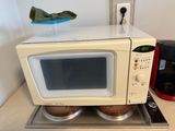 a microwave that is sitting on top of a counter