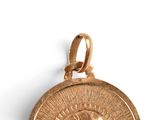 an image of a gold coin with a face of jesus on it
