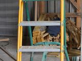 a ladder that is sitting in the middle of a room