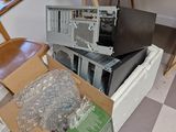a box of computer equipment sitting on the floor