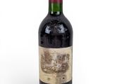 a bottle of wine that is sitting on a table