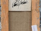 a close up of a picture frame with a label on it