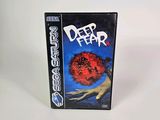 the box for deep fear is sitting on a white surface
