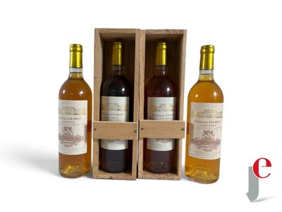 three bottles of wine in a wooden box on a white background