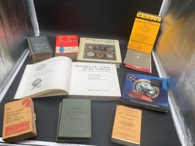 many books that are sitting on a table