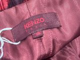 the label of a jacket is on the back of the jacket