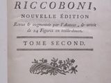 an old book with a black and white title on it