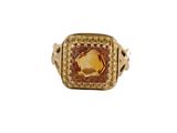 une image d'une bague en or avec une grande pierre de citrine