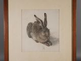 un dessin représentant un lapin assis sur un chevalet en bois