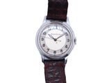 an image of a close up of a wrist watch on a white background