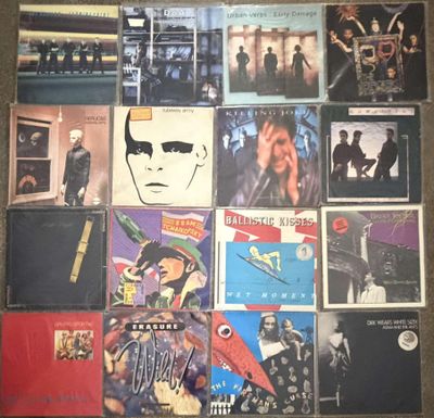 the album covers of various albums are displayed on the floor