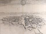 une vieille carte d'une ville avec un château en son centre