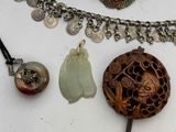 a lot of jewelry that is on a table