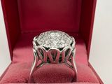 a close up of a diamond ring in a red box