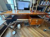 an image of a desk with a computer on it