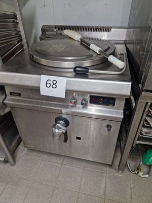 a large stove with a number on it in a kitchen
