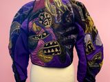 an image of a jacket on a mannequin stand with a pink background