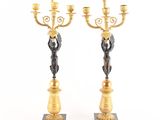 pair of antique brass candelabs on marble bases