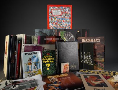 a pile of books sitting on top of a table