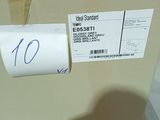 a box with a label on it sitting on the floor