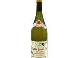 a bottle of wine that is sitting on a table