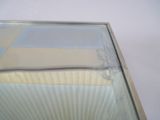 a close up of a window with a sheet of paper on it
