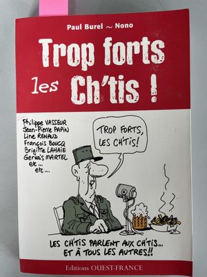 a book with a cartoon of a man sitting at a table