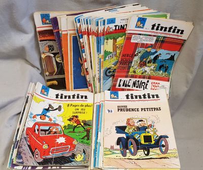un grand nombre de livres posés sur un lit