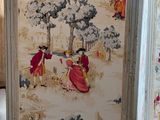 a picture of a painting on the wall of a room