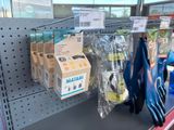many items on the shelf in the store for sale