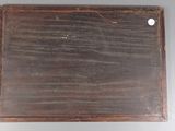 a small wooden box with a blackboard on it