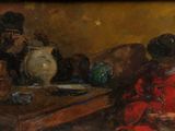 un tableau représentant deux femmes assises sur un canapé