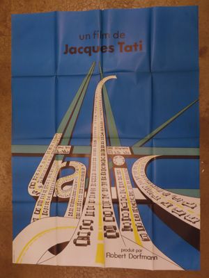 a poster on the wall of a public transit station