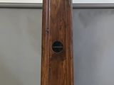 a grandfather clock in the middle of a room