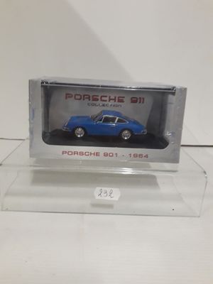 a close up of a toy car in a clear display case