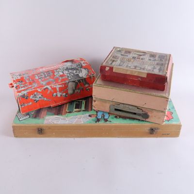 three boxes stacked on top of each other on a table