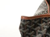 a close up of a purse with a wallet in it