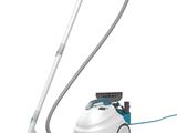 un aspirateur blanc et bleu muni d'un tuyau et d'un cordon d'alimentation