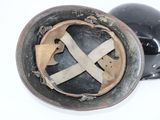 a helmet that has a cross on the side of it