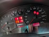 a close up of a speedometer in a car