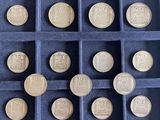 a lot of coins that are in a box