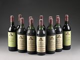 six bottles of wine are lined up in a row