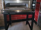 an image of a commercial pizza oven in a kitchen