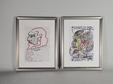 deux tableaux encadrés représentant deux dessins accrochés à un mur blanc