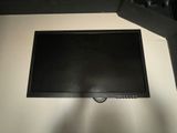 a flat screen tv mounted on a wall in a room