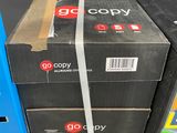 boxes are stacked on top of each other on a shelf